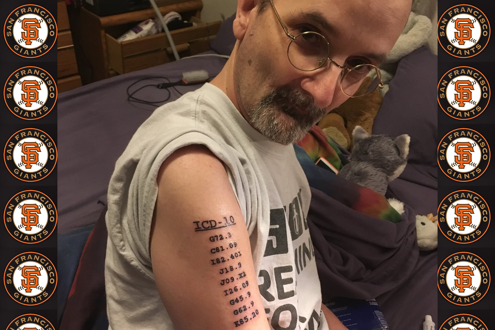 Doug, with his ICD 10 codes tattooed on his arm